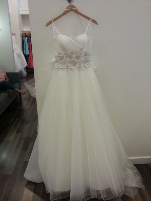 It's a rainy day here on the East Coast, I'm in need of sunshine.  So show me your wedding dress