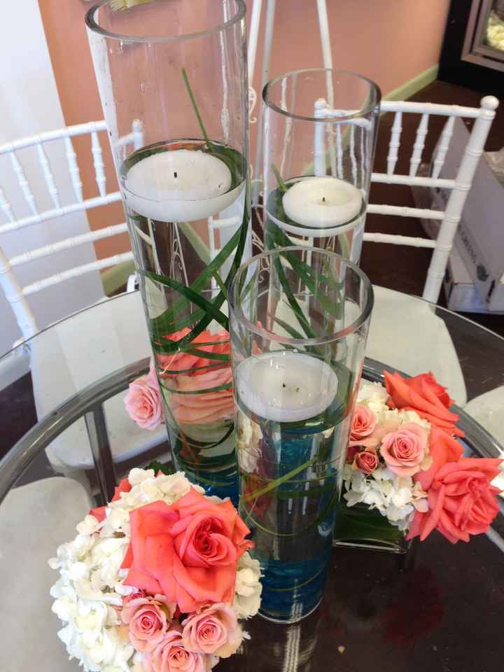 Centerpieces.  I posted these before but I'm stressing on the height. Need opinions.