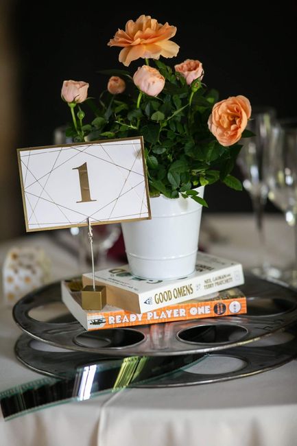 Sweetheart table centerpiece with our favorite books