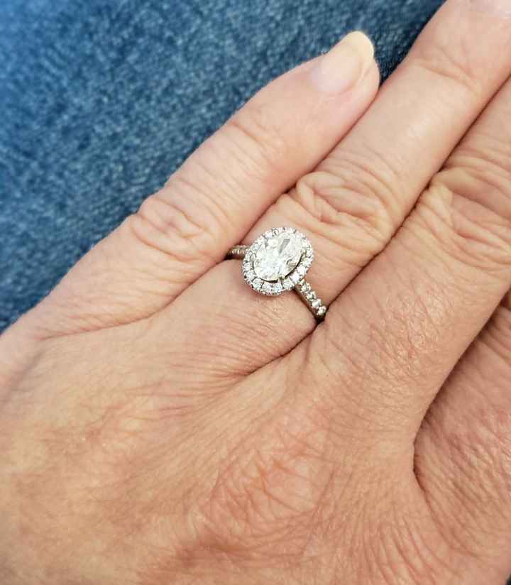 Custom made antique style oval engagement ring