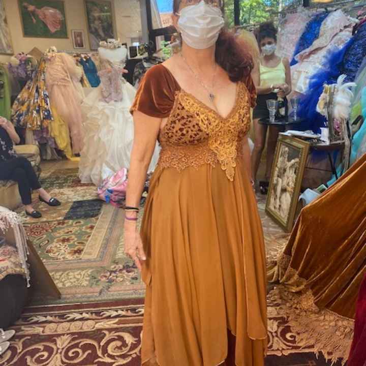 How many... dresses have you tried on? - 1