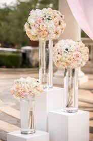 Moving floral pieces from ceremony to reception - 1