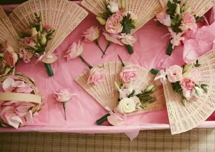 When your dress has flowers, what do you hold?