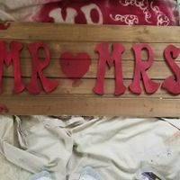 Boutineers, sign for table, and photo area