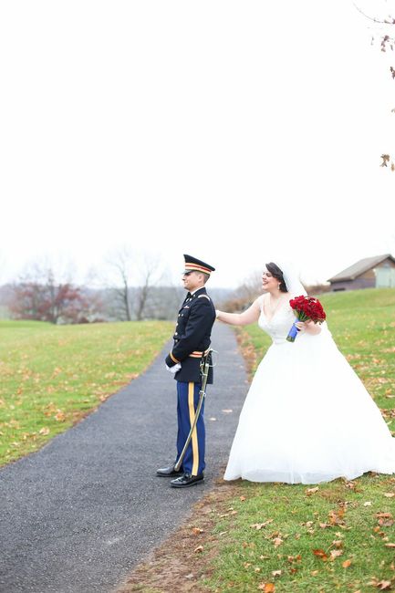 Tapping his shoulder 