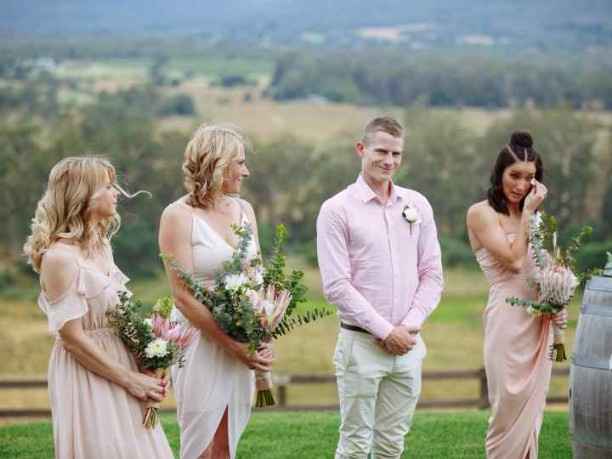 boutonniere with no jacket on bride's side