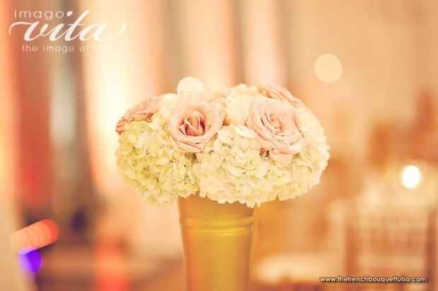 My wedding color is gold with champagne. What color of flowers should I get???