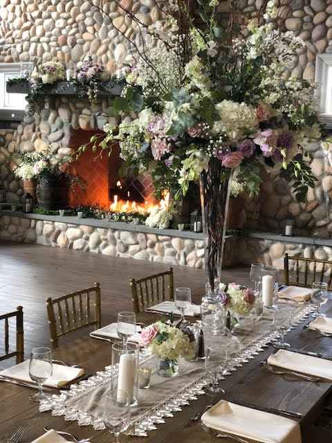 Minus the larger arrangement.  3 or 4 jars per table plus pillar and votive candles.