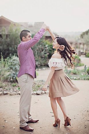 Cute engagement photo idea couple dancing 