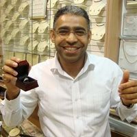 23 small diamonds, and one bigger diamond... I LOVE IT. Lets see some rings my fellow brides.