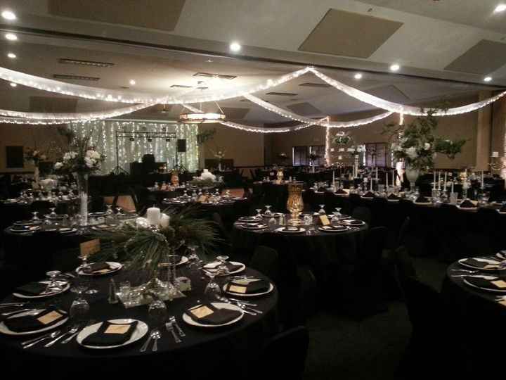 black reception tables dark floor