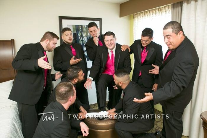 Groomsmen cleaning his shoes 