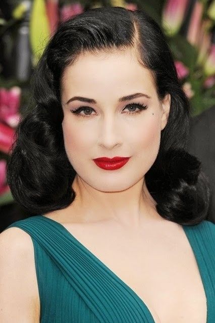 Vintage hairstyle with bangs? Will they grow out in time?