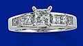 23 small diamonds, and one bigger diamond... I LOVE IT. Lets see some rings my fellow brides.