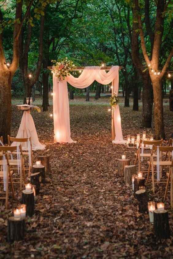 aisle decor outdoor wedding tree stumps candles alter