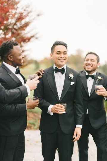 black tux groom groomsmen
