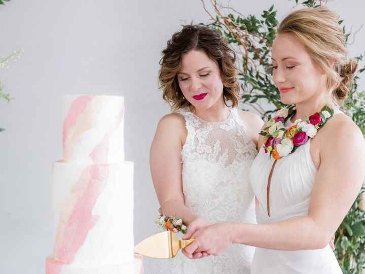 brides couple wedding cake cutting