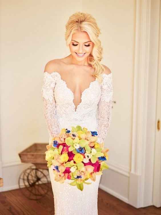 plunging neckline bride with bouquet colorful  flowers