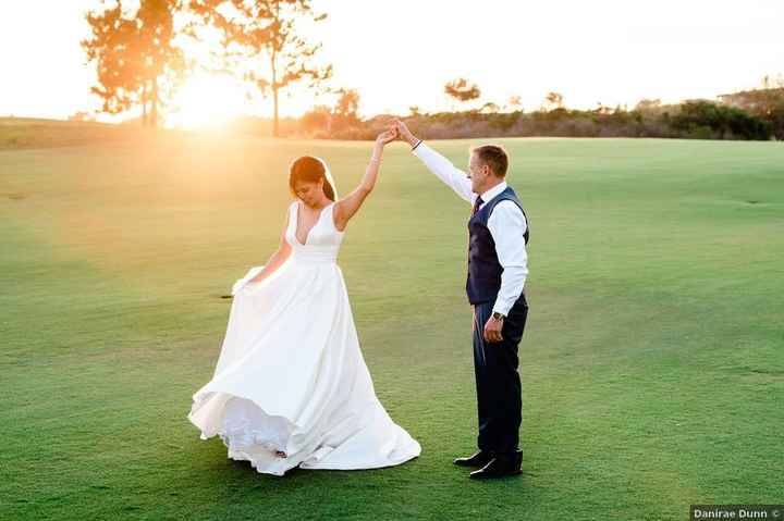 couple dancing timeless dress sunset