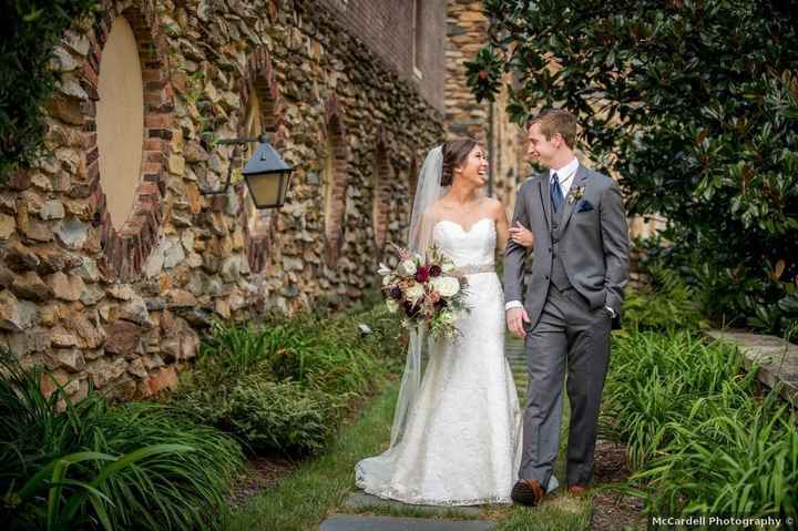 couple walking on wedding day belt on dress 