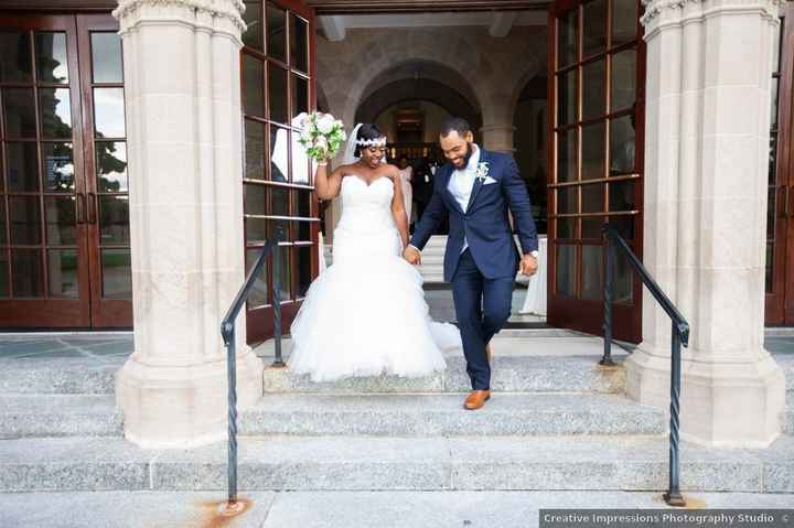 couple walking on wedding day no belt on dress 