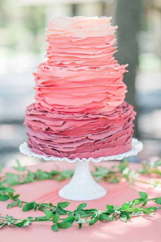 pink wedding cake with frosting 