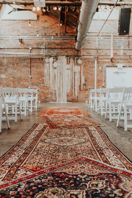 vintage rugs as aisle runners for a wedding