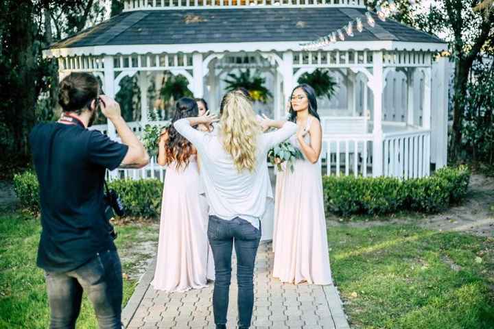 photographers at work with a wedding party, two shooters