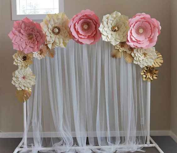 wedding backdrop with pipping, draping and flowers