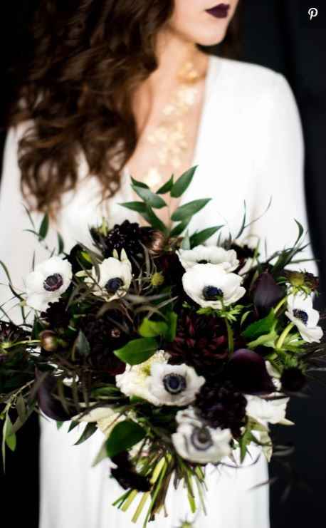 black wedding bouquet with greenery and white flowers