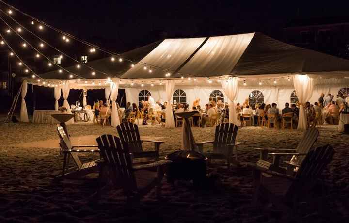 beach wedding venue with tent and string lights