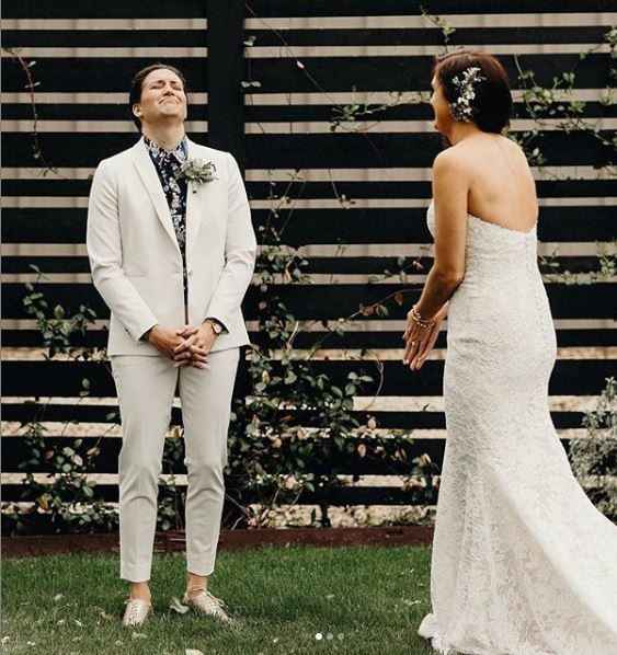 couple first look, two brides first look, white suit with patterned shirt
