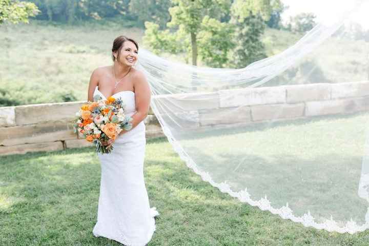 bridal portrait, long cathedral veil, orange and green bouquet