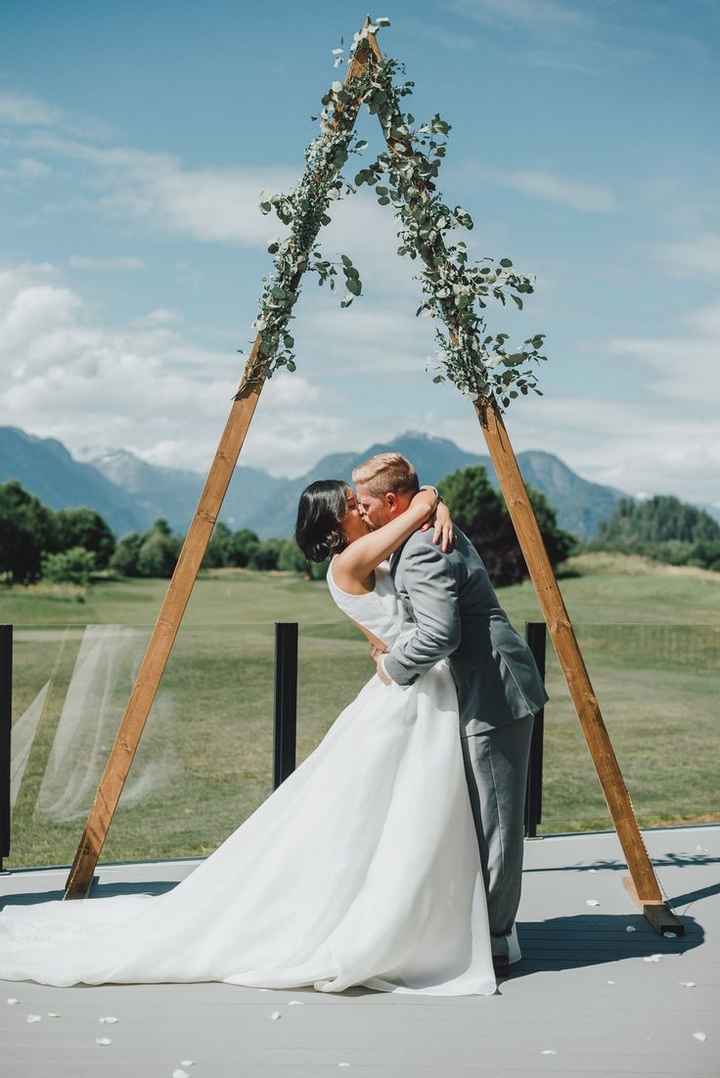 triangle wedding arch with greenery