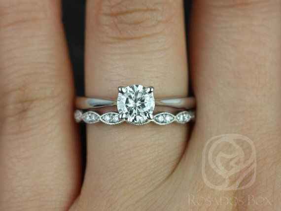 twisted wedding band with a prong setting solitaire engagement ring