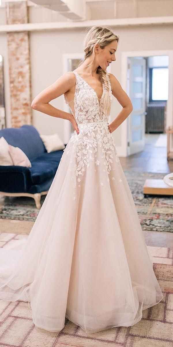 blush wedding dress on blonde bride