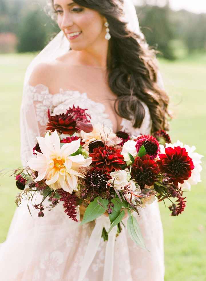 blush wedding dress with burgundy wedding bouquet