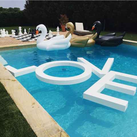 wedding pool decor with love floats