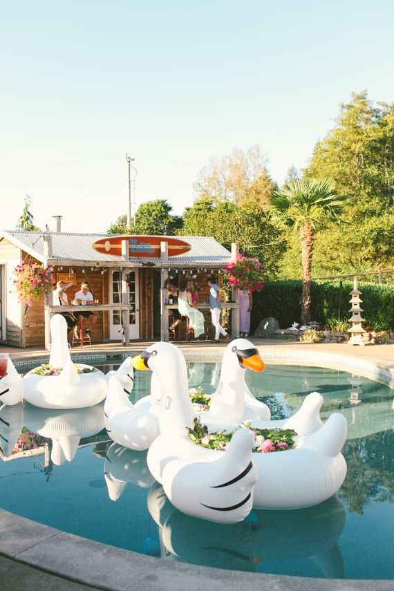 wedding pool decor, inflatable swans with flowers