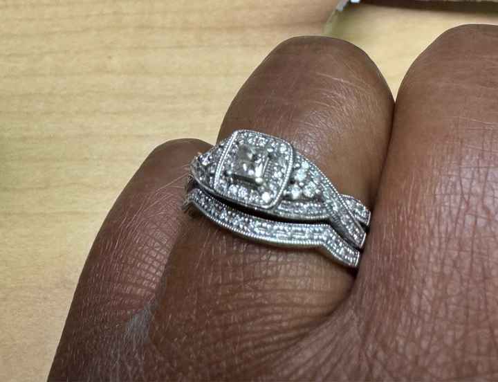 Does anyone have a twisted band diamond engagement ring? And what kind of wedding band did you get? 