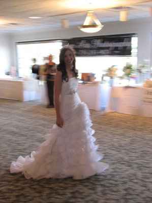 He doesn't like the dress..