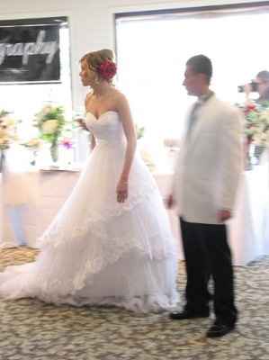 He doesn't like the dress..