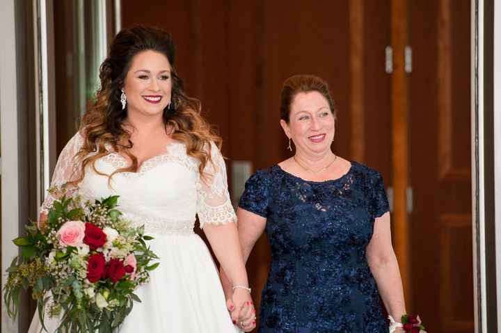 Mother walking Bride down the aisle