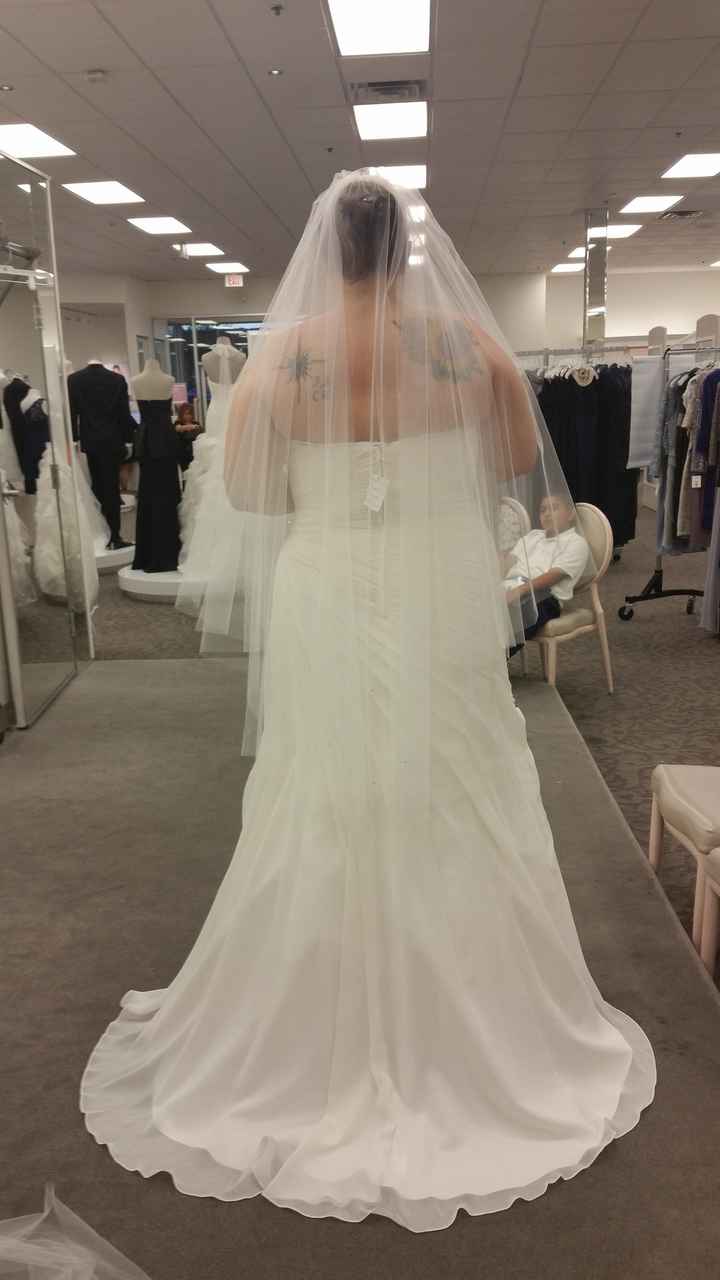 It's a rainy day here on the East Coast, I'm in need of sunshine.  So show me your wedding dress