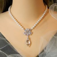 Which necklace works better with my wedding dress? Finally narrowed it down to 2! *PICS!