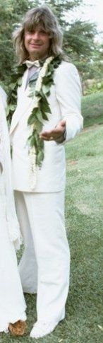 Groom in white? ...and men's coats???