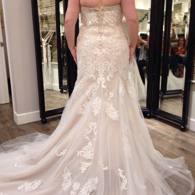 How much was your wedding dress? 3