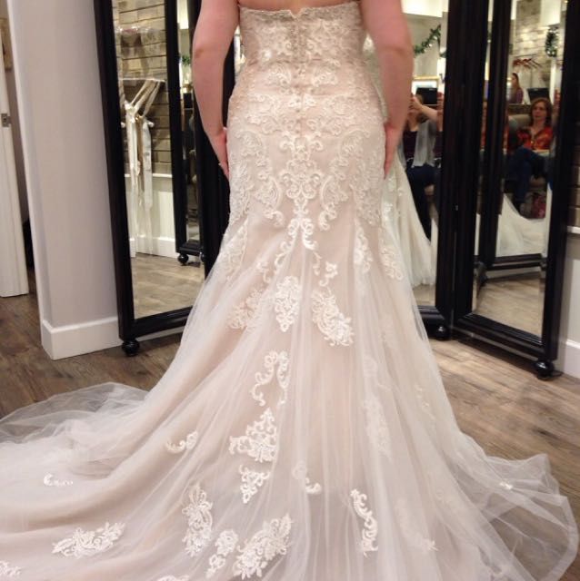 How much was your wedding dress? 4