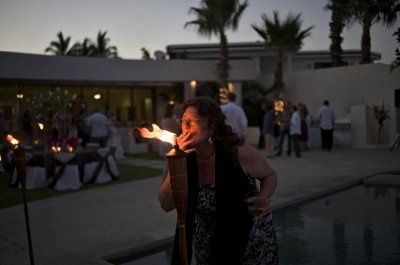 POST pics of your dress, your flowers, your man,  friend lighting cig of a tiki torch & your boobs!