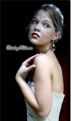 Is it possible to wear a tiara and a blusher veil?